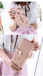 Pink PU leather long wallet detail featuring hollow leaf pattern and metal leaf pendant