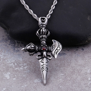 Vintage steel Vajra pendant necklace with red ruby and axe detail on dark stone