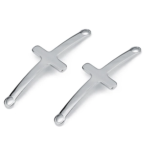 Polished stainless steel curved cross pendants with dual connector loops on white background