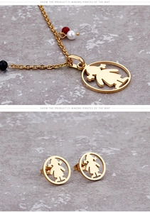Detail of gold titanium necklace and stud earrings featuring girl silhouette cutout