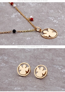 Detailed set of gold angel pendant necklace and stud earrings with colorful bead accents