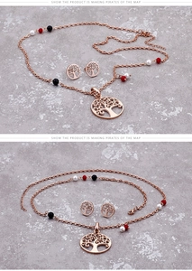 Detailed view of rose gold Tree of Life jewelry set with colorful accent beads
