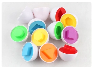 Macro shot of colorful geometric shape matching eggs for baby cognitive development