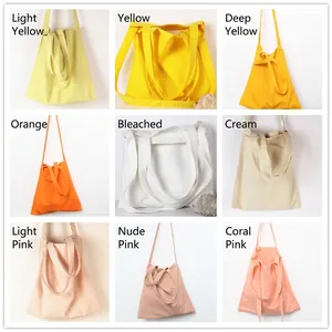 Minimalist solid color canvas tote bags in nine colors with three strap design