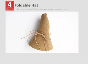 Detail view of foldable brown straw sun hat with decorative bow for compact travel storage