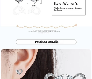 Detail view of 11mm wing-shaped silver earrings with sparkling cubic zirconia inlay