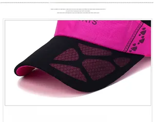 Detail of breathable rose red and black mesh baseball cap with reinforced stitching