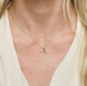 925 sterling silver necklace featuring rose gold lock and key pendants on a dainty chain