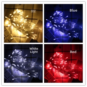 Detail view of LED decorative string lights in warm white, blue, cool white, and red tones