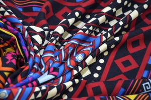 Close-up of bohemian tribal pattern fabric with colorful jacquard weave and texture