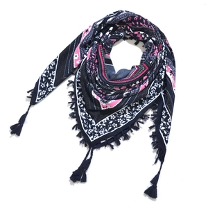 Detail of bohemian black and pink scarf featuring floral paisley patterns and tassel edges