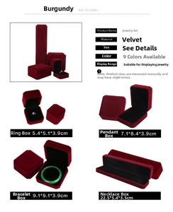 Macro detail of burgundy velvet jewelry boxes in various sizes for rings and necklaces