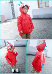 Detailed views of a red cartoon dinosaur raincoat for kids with blue back fins and hood