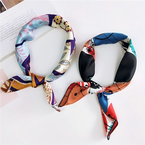 Set of two luxury printed silk scarves with floral and geometric patterns for women
