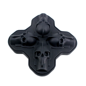 Detail of black 4-cavity silicone skull ice mold for crafting realistic skull-shaped cubes
