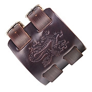 Detail of dark brown leather cuff bracelet featuring embossed dragon patterns and metal buckles