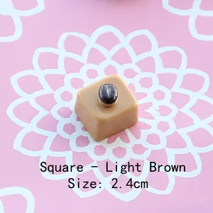 Macro detail of a 2.4cm light brown resin chocolate block for DIY crafts and decor