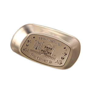 European vintage gold boat-shaped tin fruit tray with house embossing and home quote