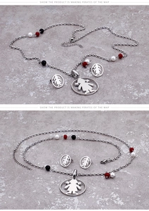 Detail view of titanium steel jewelry set featuring girl pendants and multicolor beads