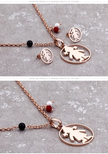 Detail of rose gold girl pendant jewelry set with colorful beads on the necklace