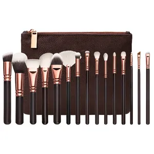 Set de 15 brochas de maquillaje oro rosa con mangos de madera y estuche de cuero