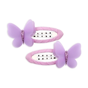 Dettaglio di fermagli a farfalla in garza viola con paillettes e base rivestita in rosa