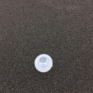 Close-up of a semi-transparent silicone sphere mold for DIY crystal resin jewelry making