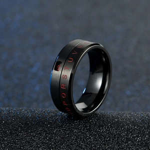 Black rotating stainless steel ring featuring red engraved letters and numbers