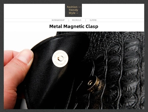 Detail of the golden round magnetic clasp on the black crocodile pattern leather bag