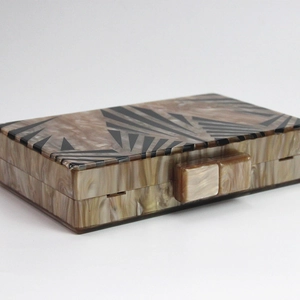 Women's acrylic geometric marble clutch bag with brown and beige patterns and black lines