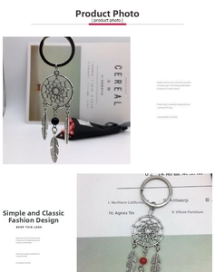 Detailed silver dreamcatcher keychain featuring metallic feathers and colorful beads