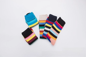 Detailed view of colorful striped cotton crew socks with ribbed cuffs and vibrant colors