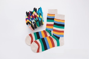 Close-up of colorful striped cotton crew socks with detailed ribbed cuffs and soft texture