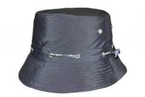 Detail of outdoor fisherman hat with metal air vents and Sport logo ribbon