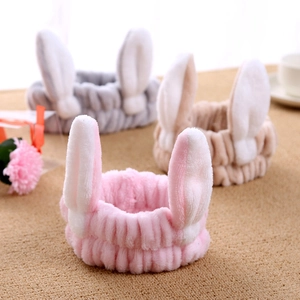 Plush bunny ear headbands in pink, grey and beige for face washing and makeup