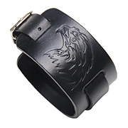 Detailed macro view of the embossed eagle head pattern on the black leather wristband