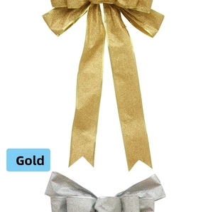 Detail of large gold and silver glitter bows for Christmas tree decoration