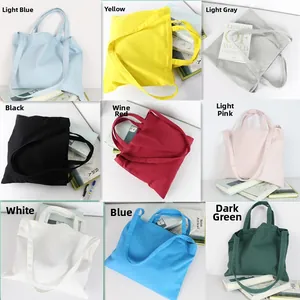 Detailed color palette showing nine variants of cotton canvas tote bags in a grid display