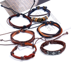 Set of 6 vintage leather bracelets with braided straps, wooden beads and star charms