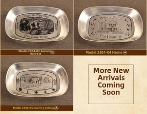 Detailed view of vintage tinplate trays with embossed harvest and home landscape designs
