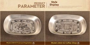 Detail view of European vintage tin trays with embossed fruit and coffee shop patterns