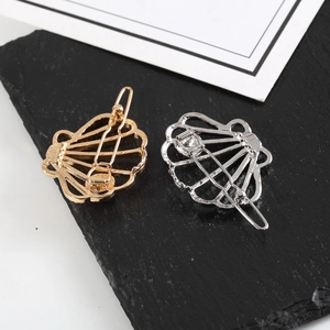 Irregular hollow shell hair clips in gold and silver finish with spring clip back