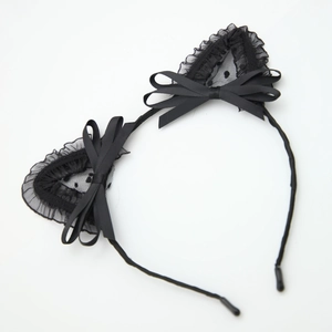Cute black cat ear headband with lace trim and double bows on a plain white background
