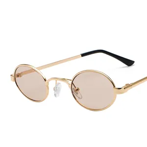 Retro small oval metal frame sunglasses with gold frame and light brown lenses