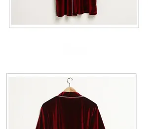 Detailed view of luxury deep red velvet robe featuring premium lapels and white piping edge