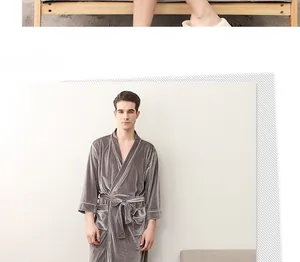 Detail of silver velvet robe featuring shawl collar, white piping, and waist belt tie