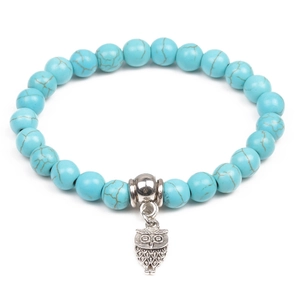 Men's 8mm turquoise beaded bracelet featuring a silver owl charm on white background