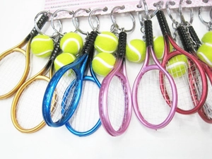 Miniature tennis racket and ball keychains set in various metallic colors with silver rings