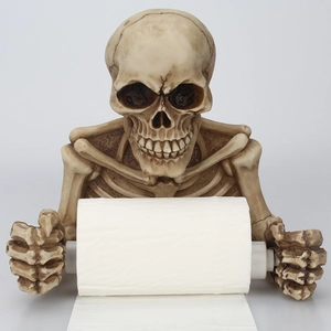 Detailed macro view of skull skeleton toilet paper holder crafted from resin