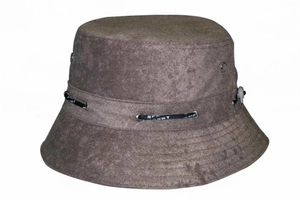 Close-up of brown bucket hat detail featuring metal eyelets and SPORT drawstring cord